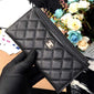 Chanel caviar quilted Classic zip pouch