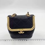 Chanel kiss lock mini bag