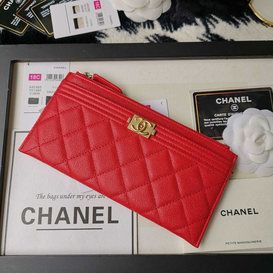 Chanel caviar quilted zip boy pouch