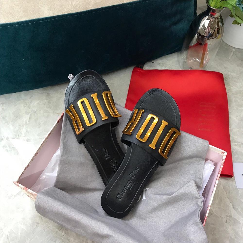 black and gold dior slides