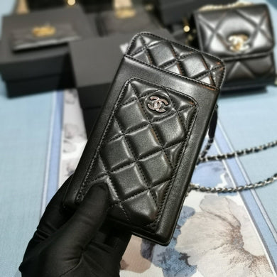 Chanel quilted phone holder wallet
