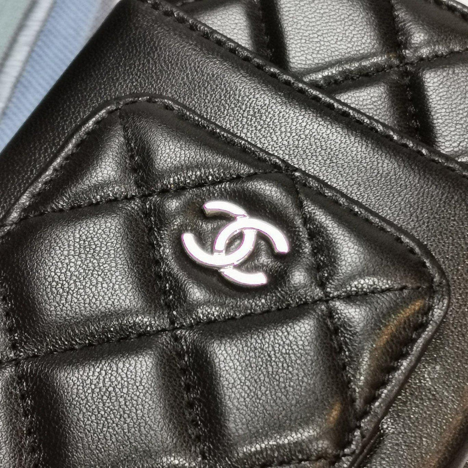 Chanel quilted phone holder wallet