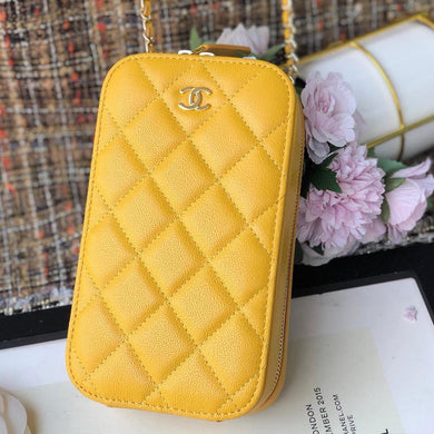 Chanel caviar zip phone case yellow