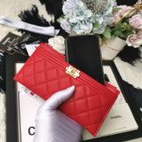 Chanel caviar quilted zip boy pouch