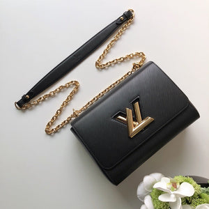 black and gold lv bag