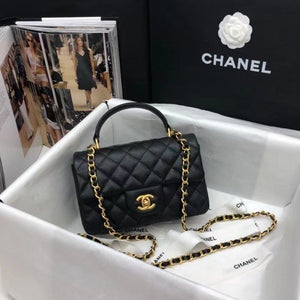 Chanel Mini Flap bag with Top Handle Caviar